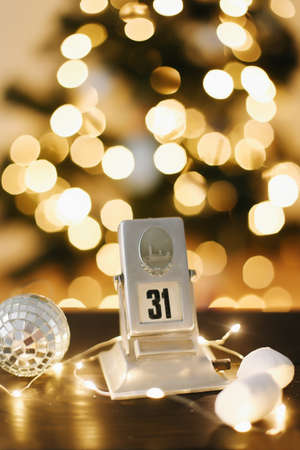 Calendar on the background of New Year's lights and decorations. New Year Eve, December 31st.の写真素材