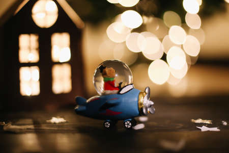 Christmas gift. Still life on dark background. New Year's lights and decorations. Flat layの写真素材
