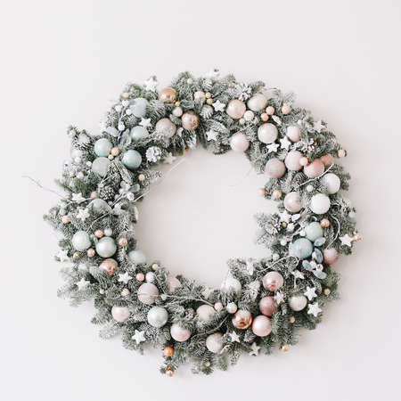 New Year interior.  Wreath of spruce  with garland. Christmas decorations. Holiday conceptの写真素材