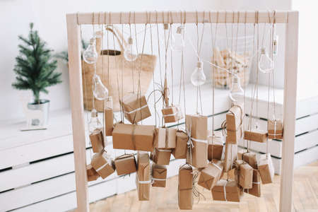 Decorated Christmas gifts. New Year festive interior. Christmas decorations. Holiday concept.