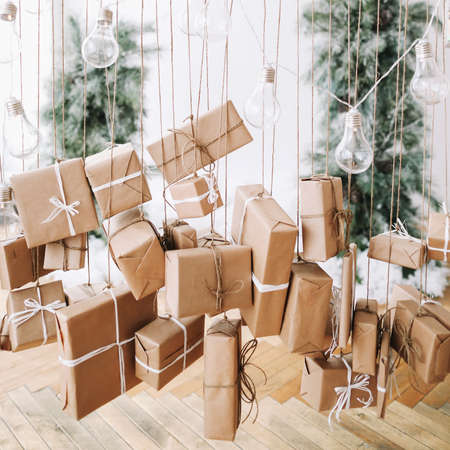 Decorated Christmas gifts. New Year festive interior. Christmas decorations. Holiday concept.の写真素材