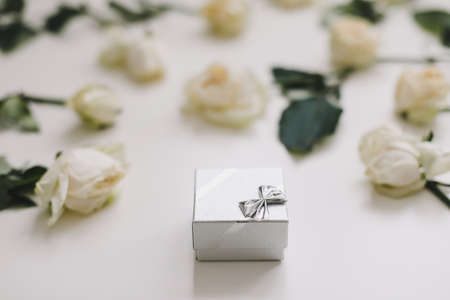jewelry ring box and white roses. Wedding, Love, Valentines day, Happy Birthday conceptの写真素材