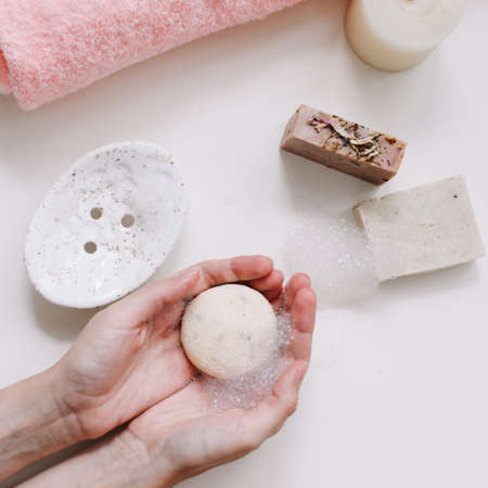 Women hands with natural organic soap top viewの写真素材