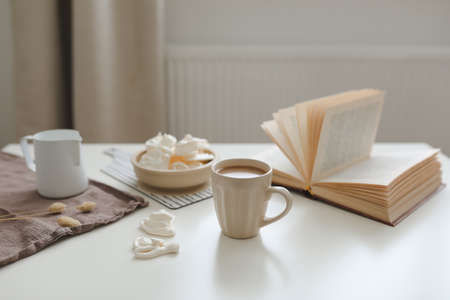 breakfast with a cup of coffee on a white table top view, flat layの写真素材