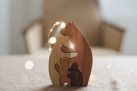 Family of wooden toy bears. Handmade wooden eco-friendly toys for kids.