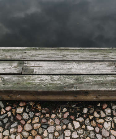 cloudy sky reflects on the surface of calm waterの写真素材