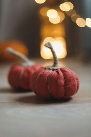 Home autumn decor with cozy fabric pumpkins. Thanksgiving concept.の写真素材