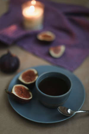 cozy composition with ripe fresh figs and textilesの写真素材