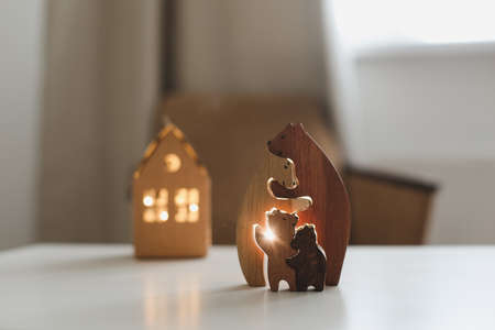Family of wooden toy bears. Handmade wooden eco-friendly toys for kids.の写真素材