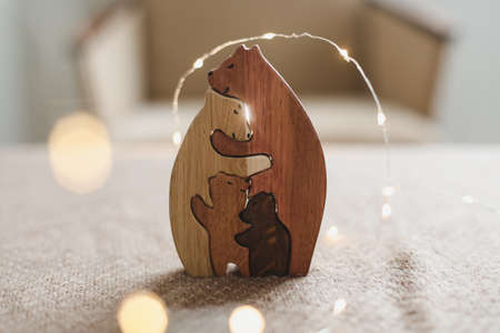 Family of wooden toy bears. Handmade wooden eco-friendly toys for kids.の写真素材