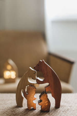 Family of wooden toy bears. Handmade wooden eco-friendly toys for kids.の写真素材
