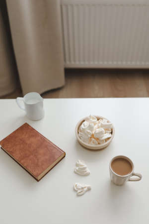 breakfast with a cup of coffee on a white table top view, flat lay