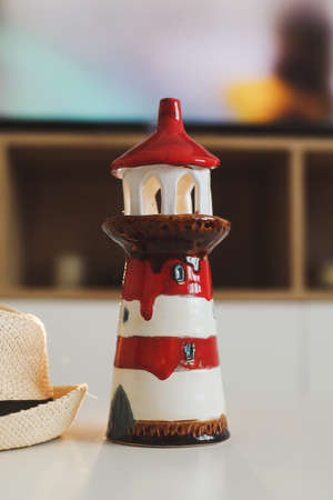 decorative lighthouse by seascape background. Sea, Travel, Vacation concept.の写真素材