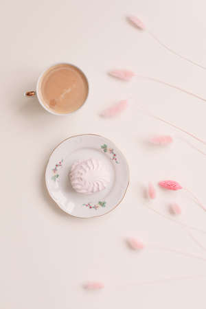 Good morning banner. Cup of coffee and homemade dessert zephyr. Top view. Food Photography with copy space. A cup of coffee and an airy marshmallow. Culinary background.の写真素材
