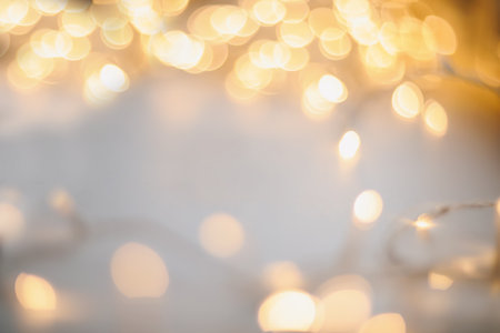 abstract shiny gold background. blured bokeh glowing golden background for design with copyspace....