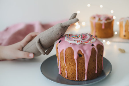 Easter cake, colorful eggs and rabbit toy. Happy Easter holiday concept. festive spring season