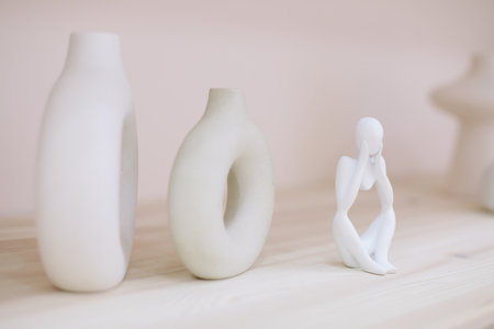 Nordic design ceramic vase. modern original designer flower vase isolated on beige background.の写真素材