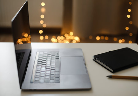Desk office with laptop on the table. Home office. Inspiration moment, workspace in the morning. selective focus.の写真素材