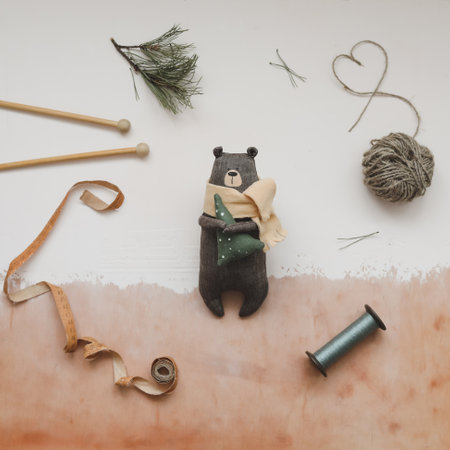 Christmas composition. Toy Teddy Bear, a gift, fir tree branches and decorations. Christmas, winter, new year concept. Flat lay, top view, copy space.の写真素材