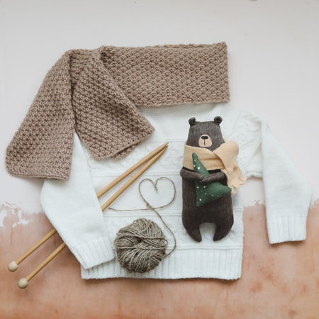 Christmas composition. Toy Teddy Bear, a gift, fir tree branches and decorations. Christmas, winter, new year concept. Flat lay, top view, copy space.の写真素材