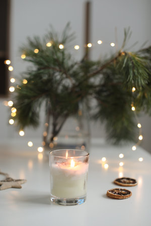 Christmas background with fir tree branches and tangerines. Merry Christmas and Happy New Year Greeting Card. Copy space. Top view.の写真素材