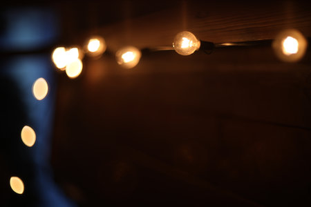 Festive backdrop fot your text or design. holiday illumination and decoration concept. Colorful defocused bokeh lights in blur night background. Defocused image.の写真素材