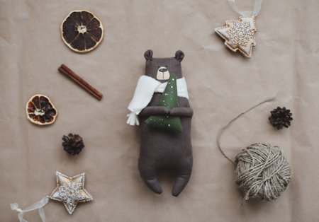 Christmas composition. Toy bear and decorations. Christmas, winter, new year concept. Flat lay, top view, copy spaceの写真素材