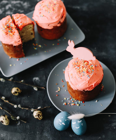 Easter Cake and Pastries, Blue Eggs and willow branches.Traditional Easter powdered sugar pastries,...