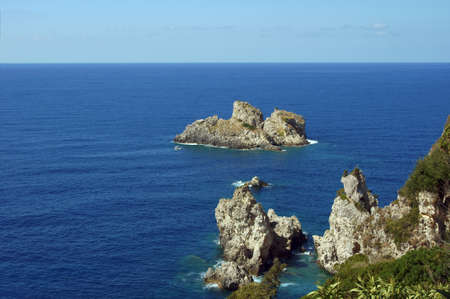 rock on coast at Corfu island, Greeceの写真素材