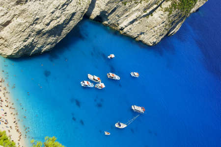 boats and shipwreck beach at Zakynthos island, Greeceの写真素材