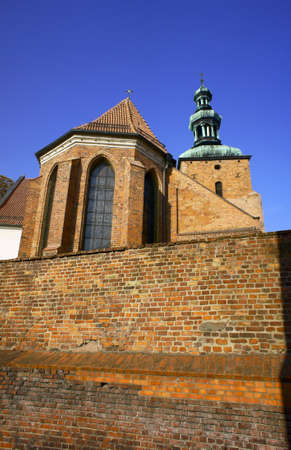 gothic church with tower, Gniezno, Polandの写真素材