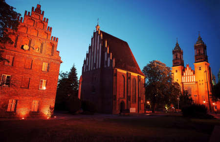 gothic buildings by night in Poznan, Polandの写真素材