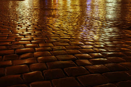 Paving the Old Market after the rain, at night in Poznan