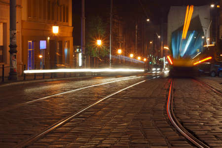 Car and trams lights in the street in Poznan