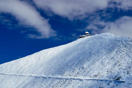 Hut on the top in the Giant Mountains in winterの写真素材