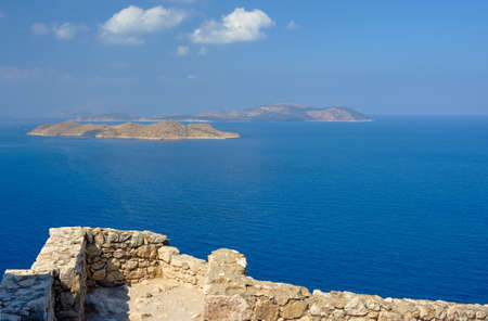 medieval walls and islands in the Mediterranean Sea in Greeceの写真素材