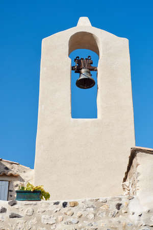 Bell tower of the medieval church in Franceの写真素材