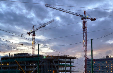 Cranes on a building site in Poznan, Poland
