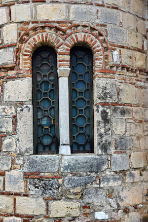 Window in old byzantine church in Corfu town, Greeceの写真素材