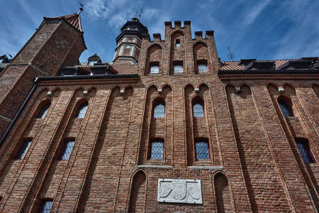 Gothic brick church with a bell tower in Gdansk