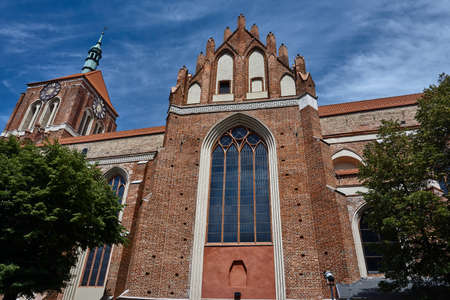 Gothic brick church with a bell tower in Gdanskの写真素材