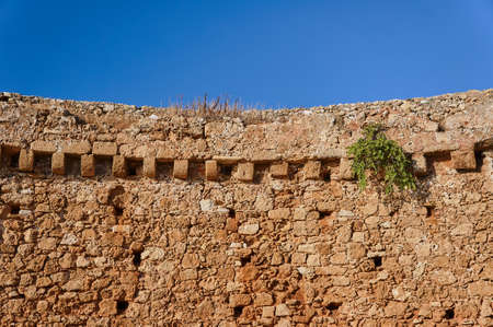 Fragment of a medieval defensive wall Venetian fortress on the island of Crete