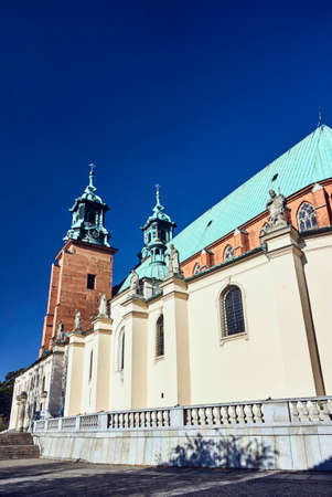 Towers and statues of the Basilica Archdiocese of Gnieznoの写真素材