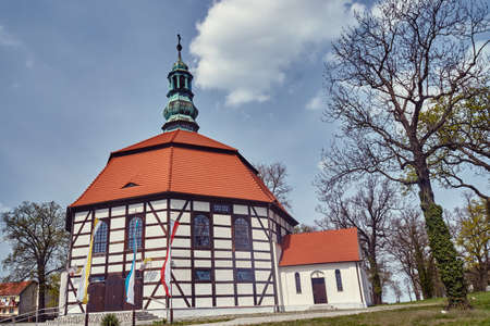 Tudor style country church with a bell tower in Polandの写真素材
