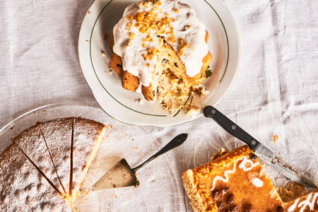 Homemade pastries - cakes on glass platesの写真素材