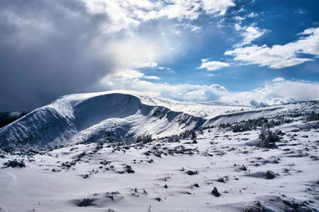 Winter landscape on a cloudy day in the Giant Mountains in Polandの写真素材