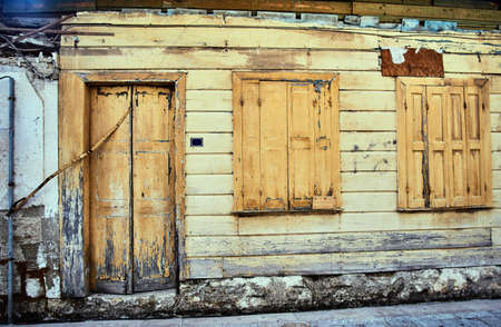 Wooden doors and shutters of a residential house on the Greek island of Lefkadaの写真素材