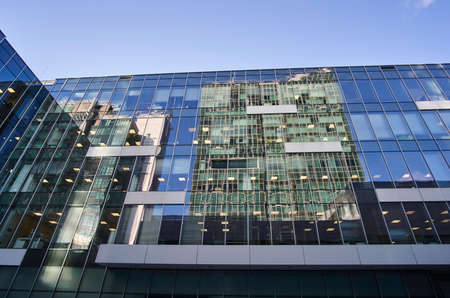 Reflection of the building in Glass facade in Poznan