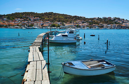 Motorboats on a wooden platform in Trogir, Croatiaのeditorial素材