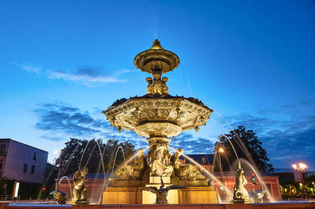 Baroque fountain in the evening in the city of Troyes in Franceの写真素材